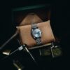 Vintage watch on a leather cushion